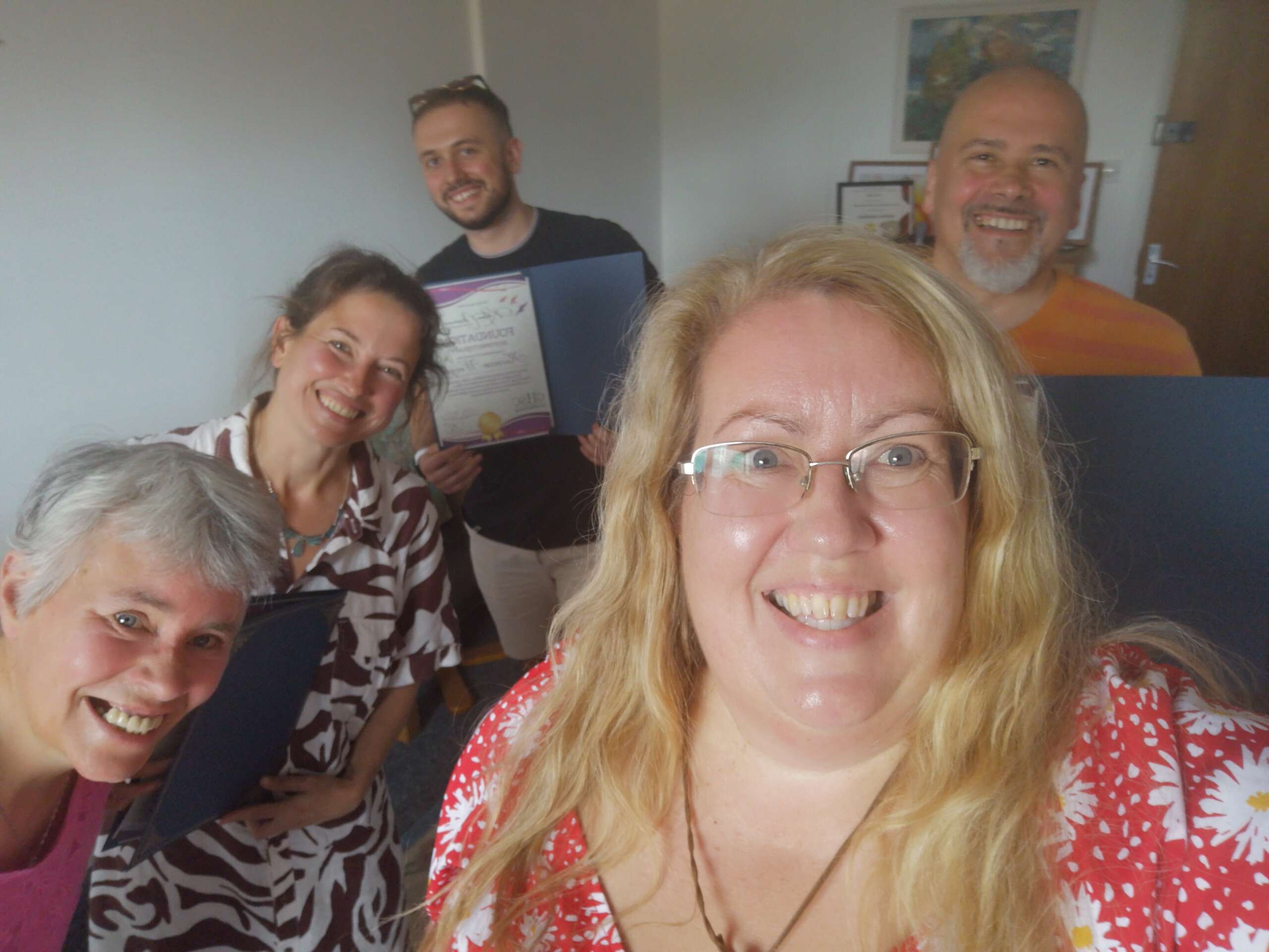 A photo of Katina and four students smiling after completing their Foundation Certificate in Hypnotherapy