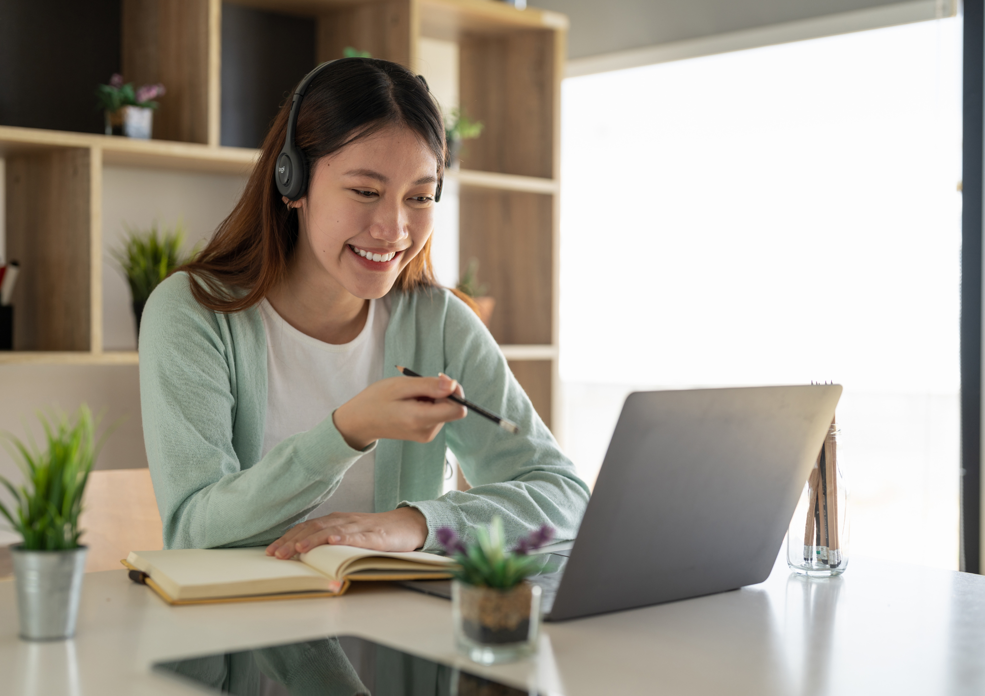 Photo of a girl studying online