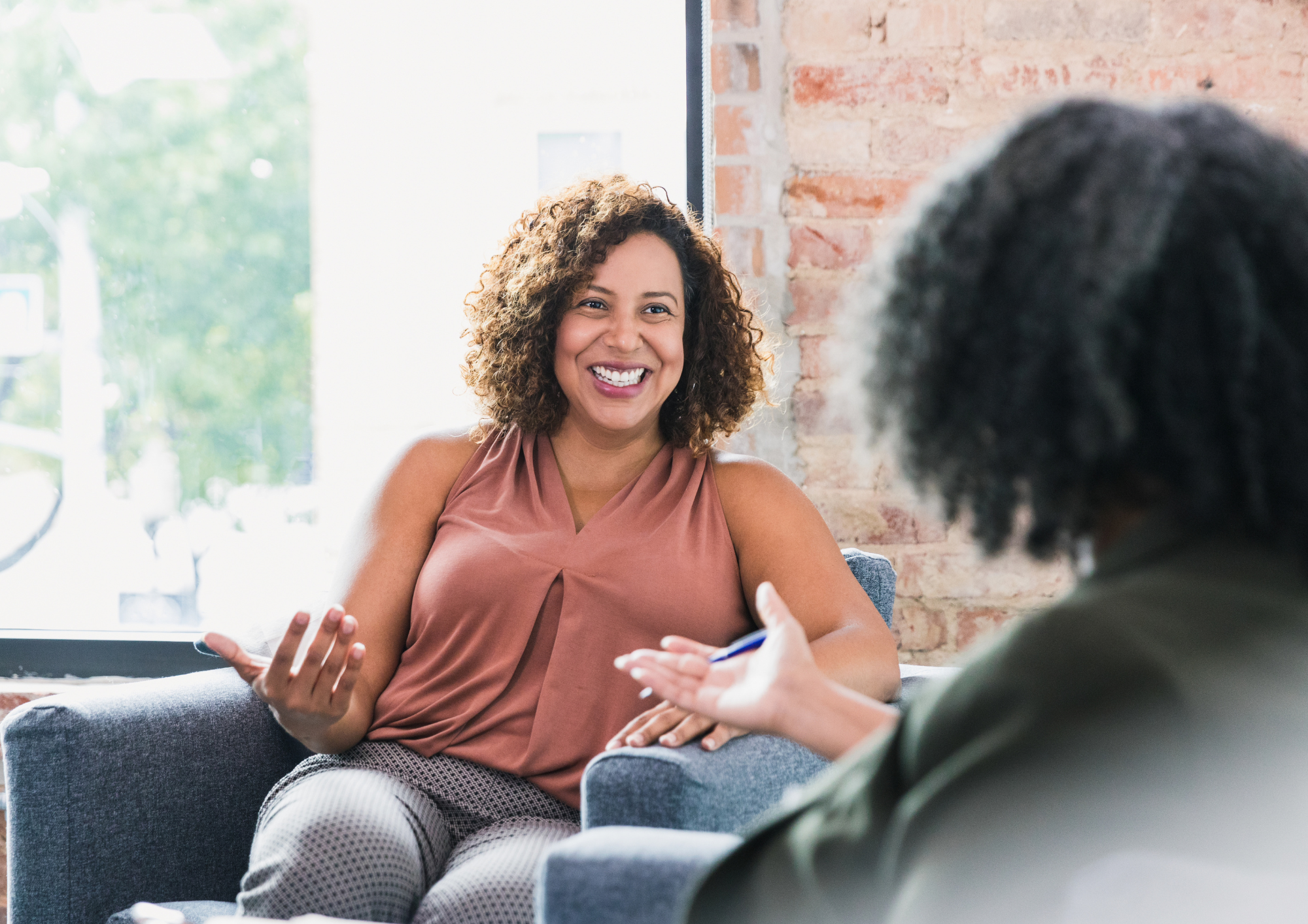Woman talking to a female therapist